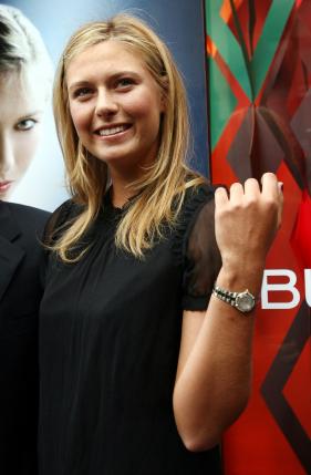 Maria Sharapova poses on the red carpet before launching her new TAG Heuer AQUARACER Steel & 18K Gold watch with diamonds in New York, August 22, 2006. Sharapova's deal with Tag Heuer had expired at the end of 2015, and the company had been in talks to extend the collaboration, it said on Tuesday. "In view of the current situation, the Swiss watch brand has suspended negotiations and has decided not to renew the contract," TAG Heuer, a unit of French luxury goods group LVMH, said in a statement. REUTERS/Shannon Stapleton